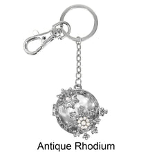 Load image into Gallery viewer, Pearl Snowflake pendant slides open to expose unobstructed magnifying glass