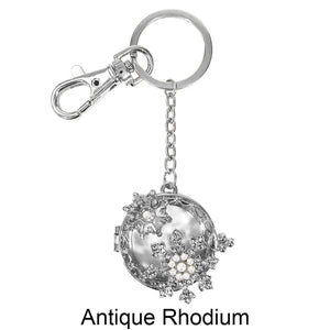 Pearl Snowflake pendant slides open to expose unobstructed magnifying glass