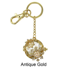 Load image into Gallery viewer, Pearl Snowflake pendant slides open to expose unobstructed magnifying glass