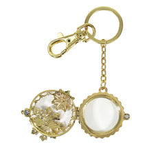 Load image into Gallery viewer, Pearl Snowflake pendant slides open to expose unobstructed magnifying glass